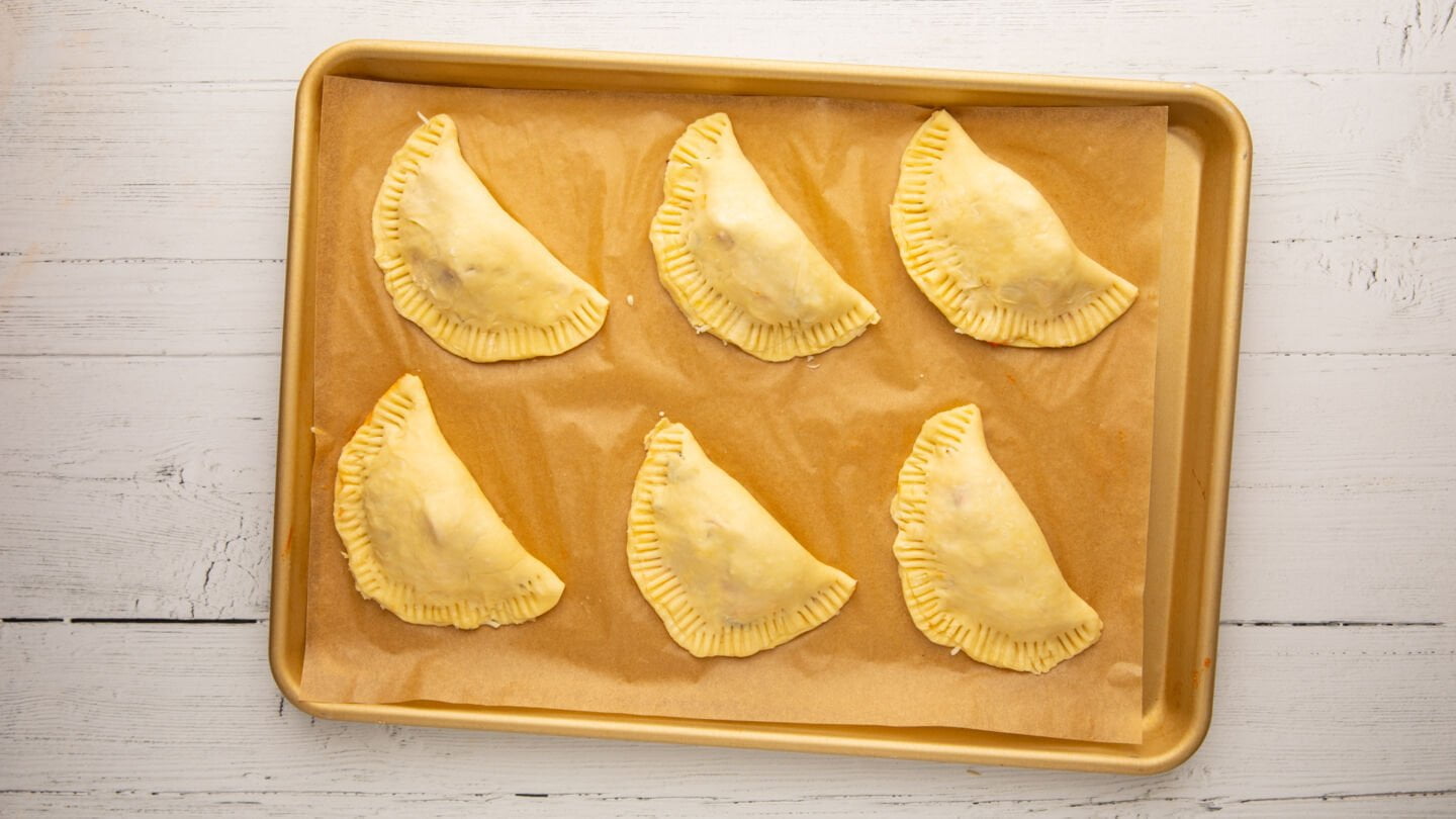 Gently fold them in half and press the edges together to seal in the filling