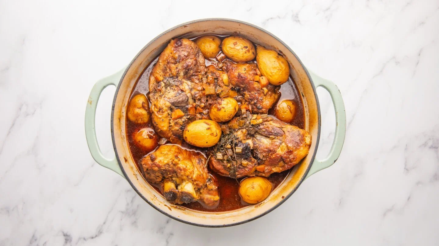 Check the braised pork shank to see if it is fork tender