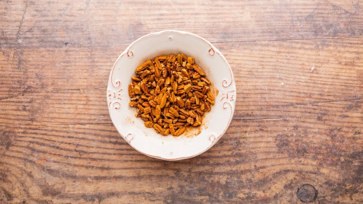 Mix the chopped pecans, brown sugar, cinnamon, and nutmeg in a medium bowl until combined.