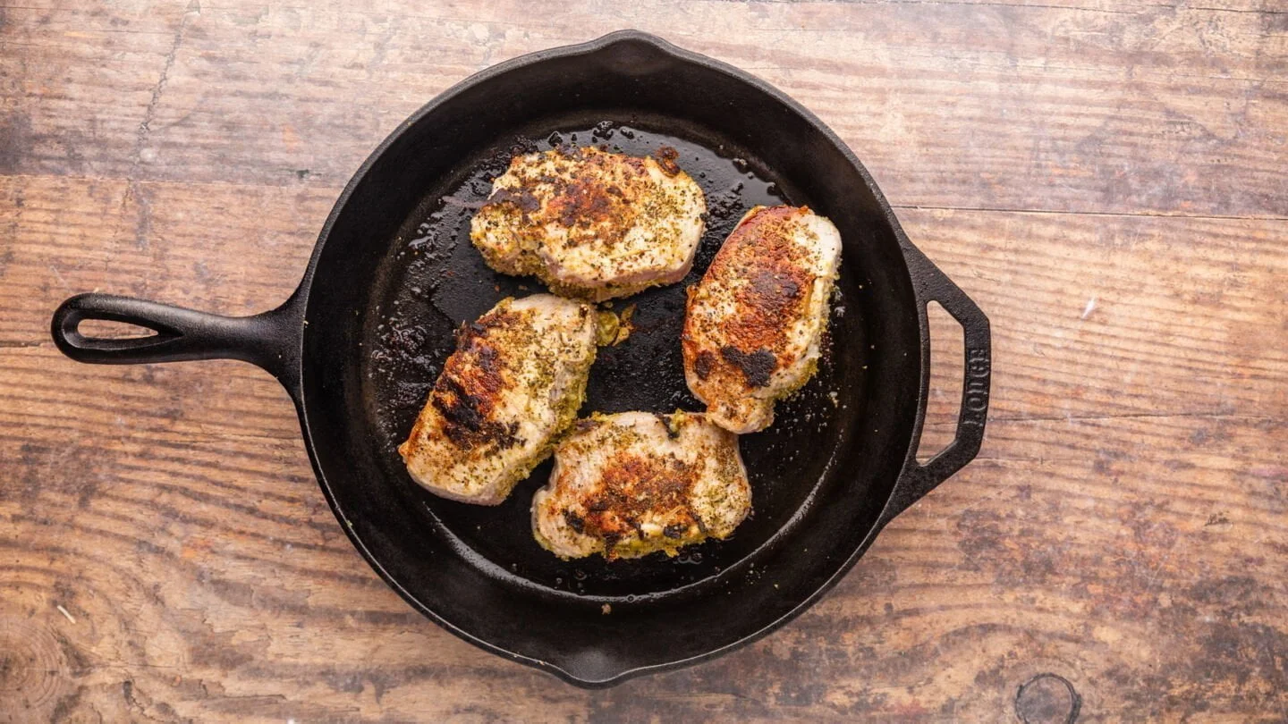 sear the pork chops in the skillet for 3-4 minutes per side until golden brown