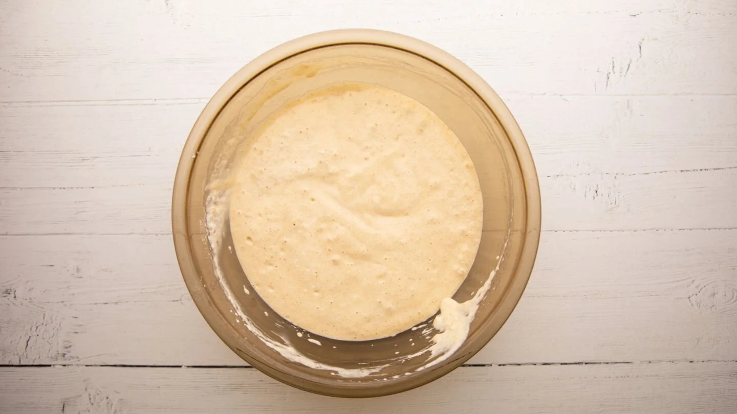 whisk the egg yolks, vegetable oil, milk, and vanilla extract.