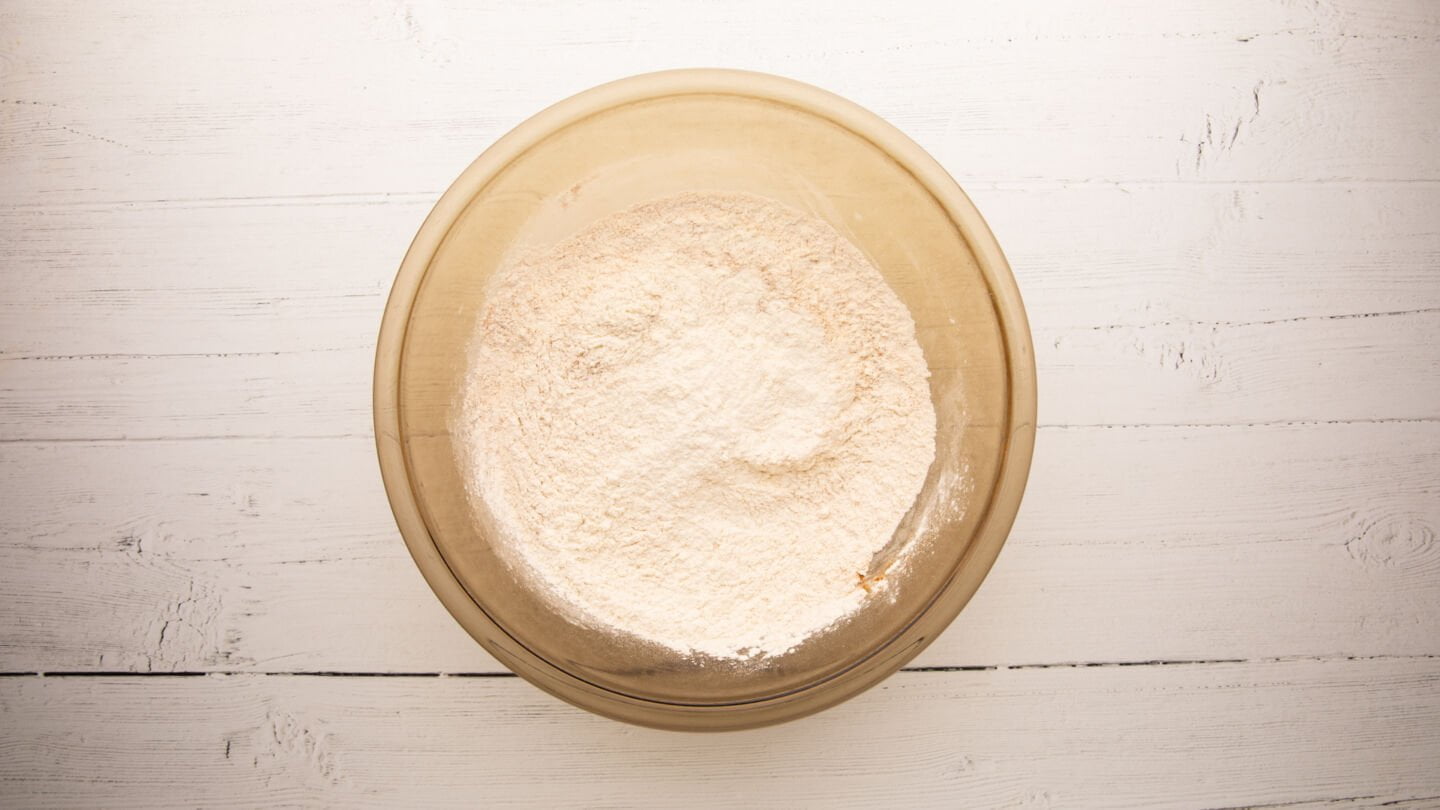 Whisk the flour, baking powder, sugar, salt, and cinnamon together in a large bowl.