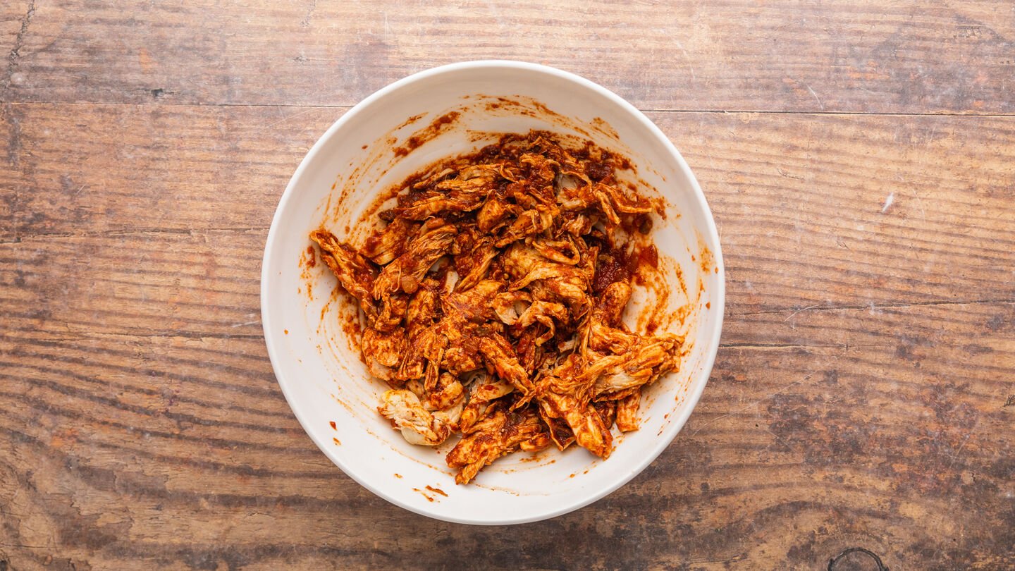 Mix the shredded chicken, spices, and salsa in a bowl.