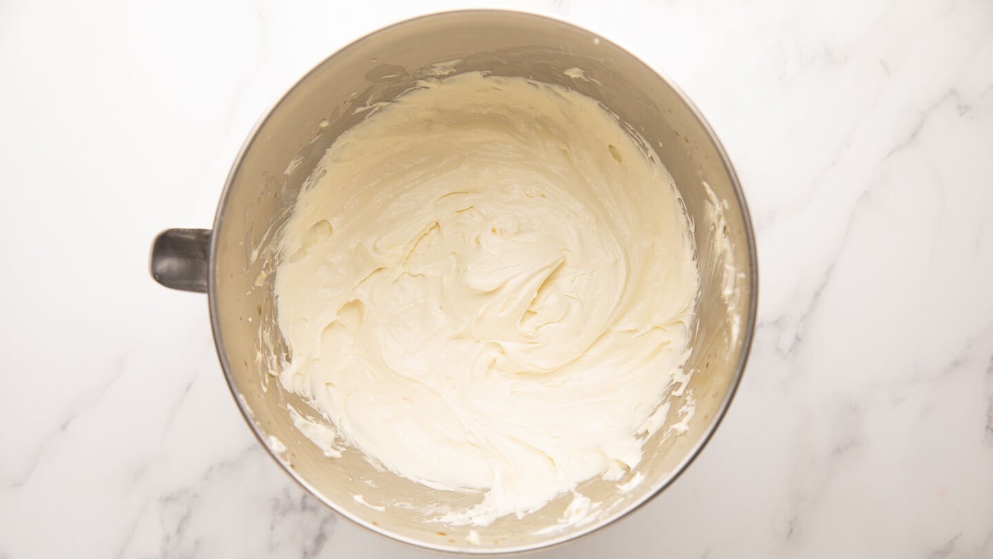 Beat the butter and condensed milk for around 5 to 7 minutes on high.