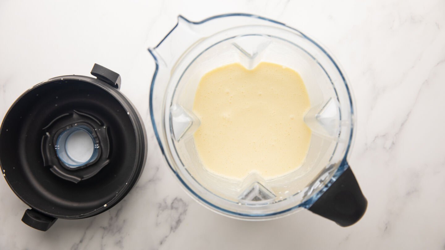 Add all of the crepe ingredients to a blender a blend for 1 minute until smooth and well combined