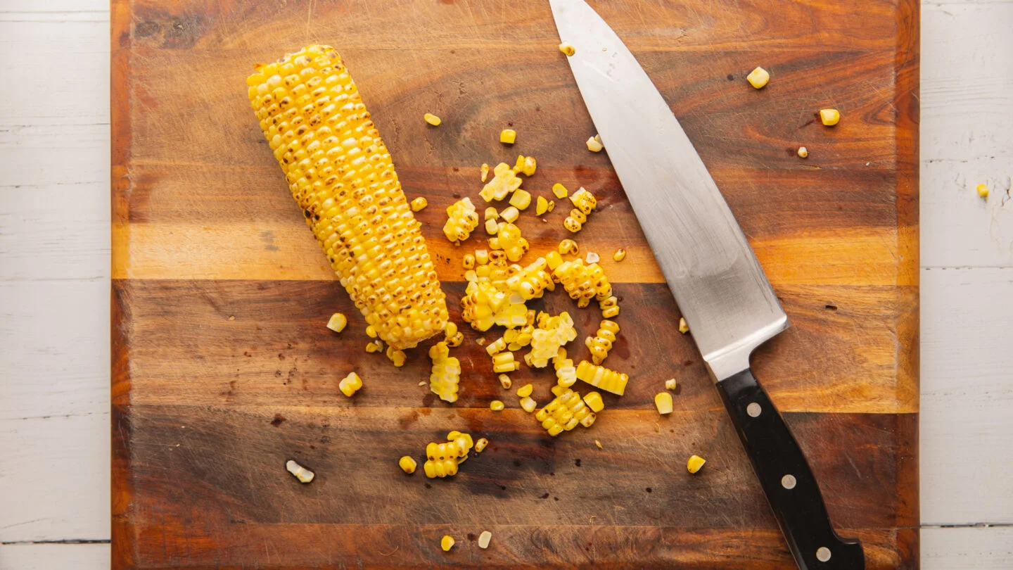 char the corn on the cob over a gas burner for about 4 to 5 minutes until the corn kernels are charred to your liking
