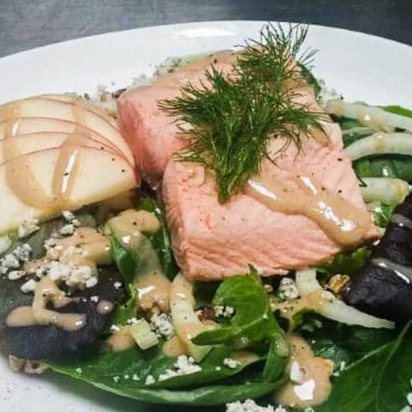 10. Poached salmon salad with apples, fennel, and blue cheese
