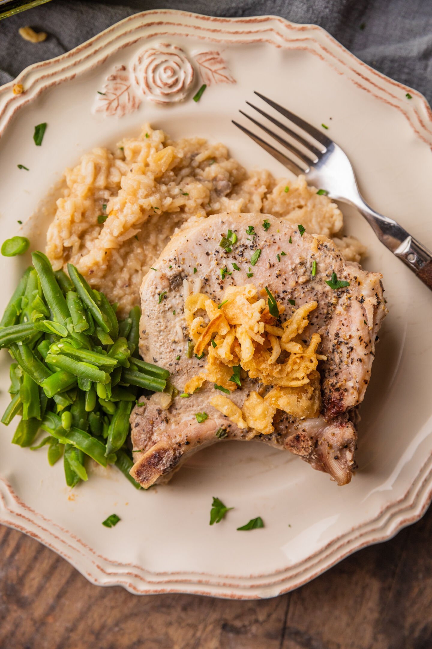 baked pork chops with rice to serve