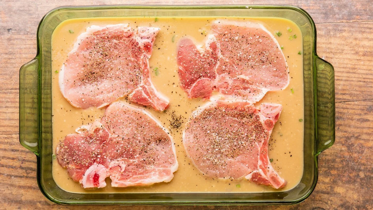 pork chops with salt and pepper onthe rice mixture